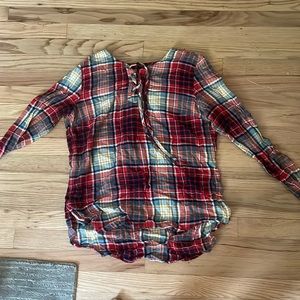 I’m selling a plaid shirt with red, blue, gold and white